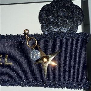 Chanel holiday 2025 star charm with gift box and blank card